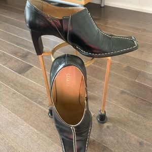 Shoes with stitching leather